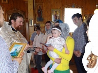 Люди с нарушениями слуха приняли Таинство Крещения